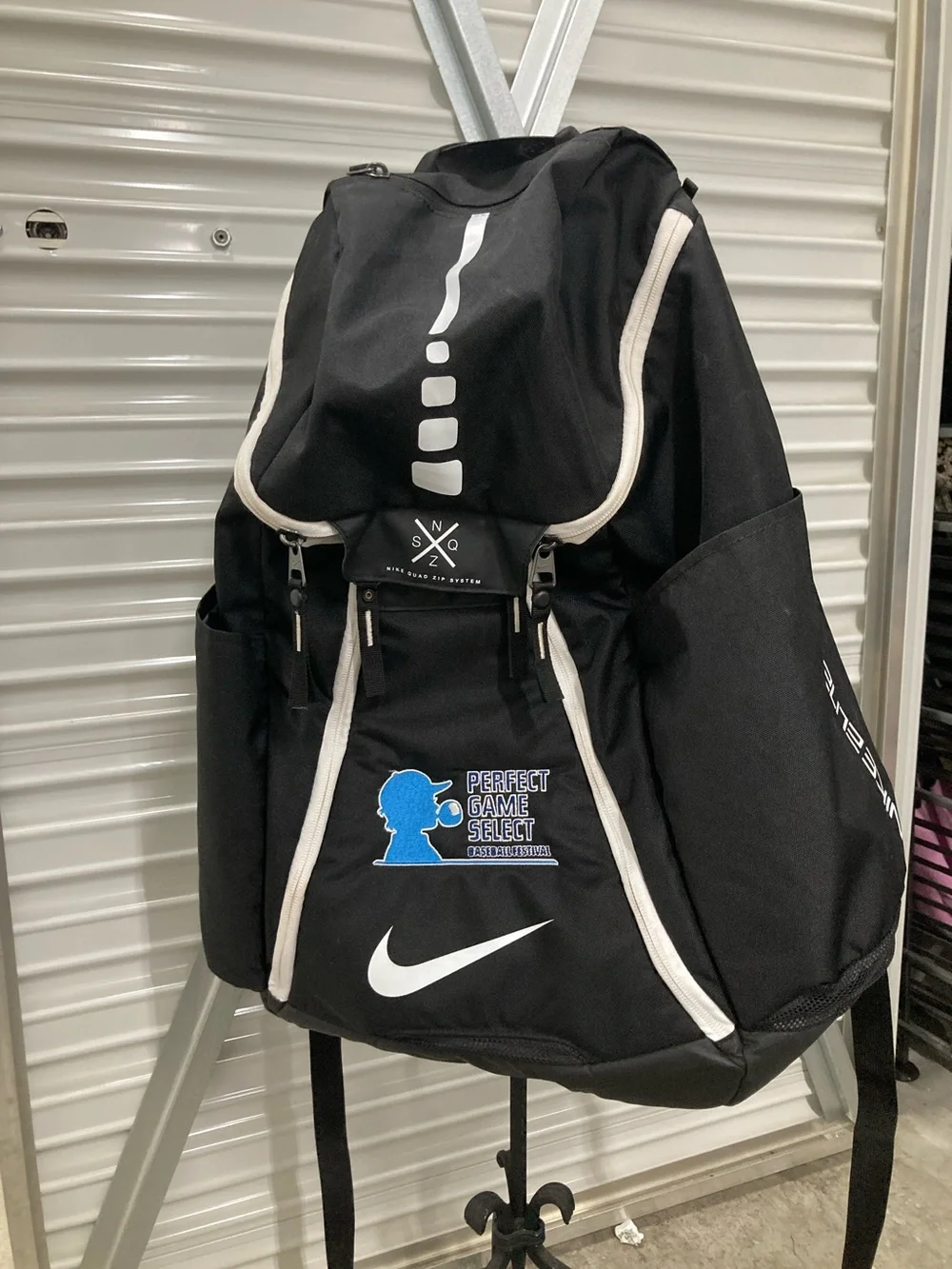 Nike Black Backpack with White Trim and Blue Logo